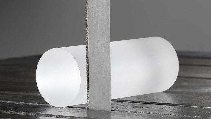 DIAMOND-STUDDED BAND SAW BLADES